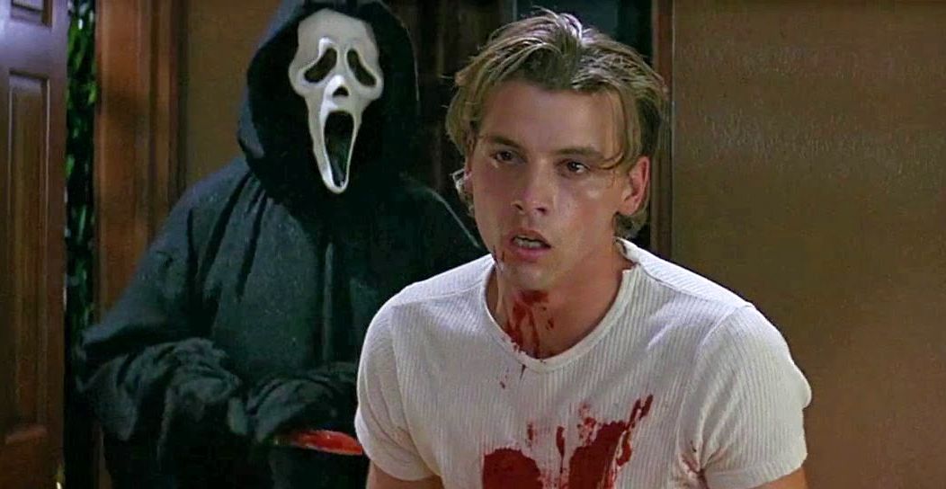 Billy Loomis (Skeet Ulrich) is stalked by Ghostface (Mathew Lillard) in Scream. 