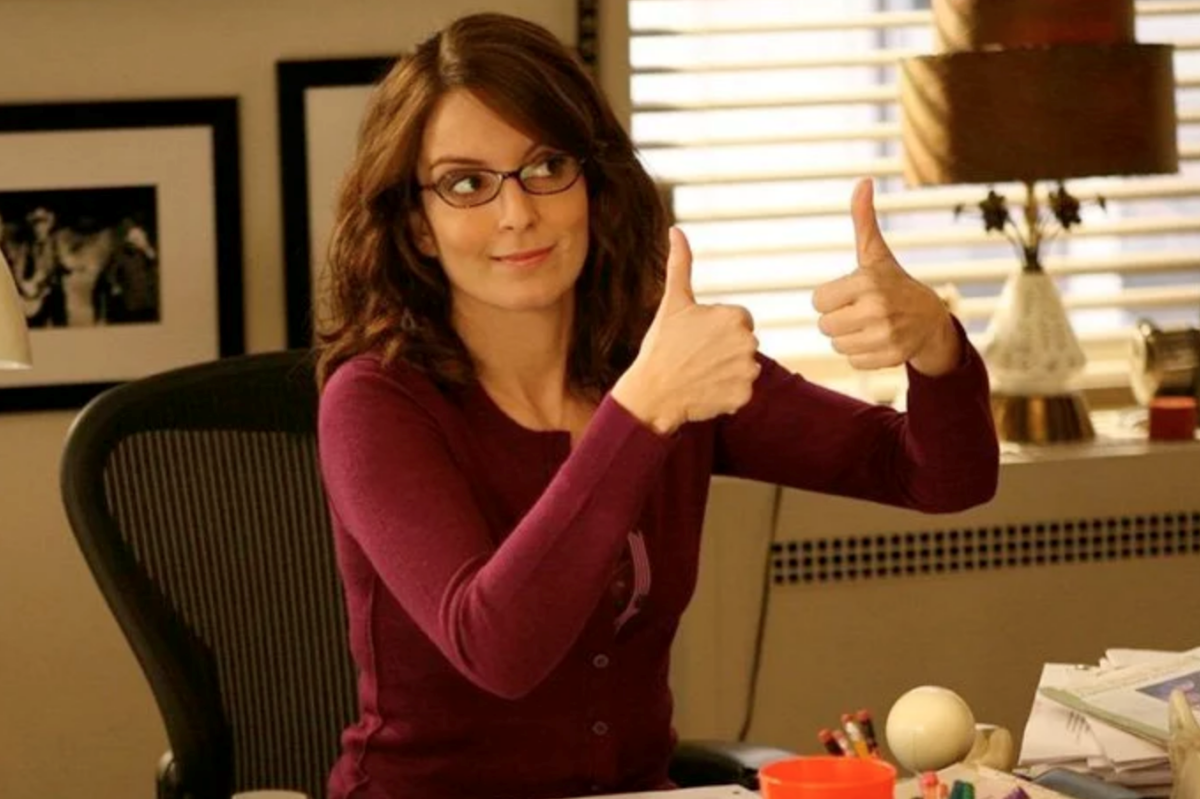 Tina Fey as Liz Lemon giving two thumbs up
