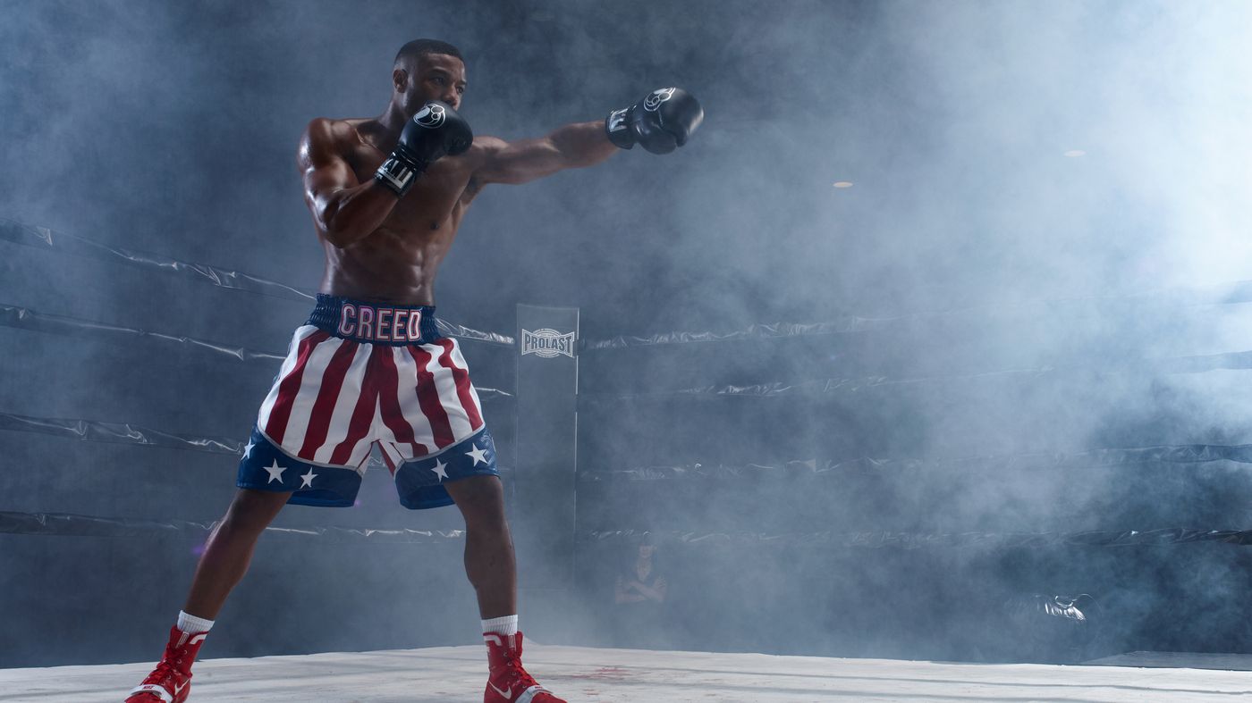 Michael B Jordan stands in the misty ring in Creed