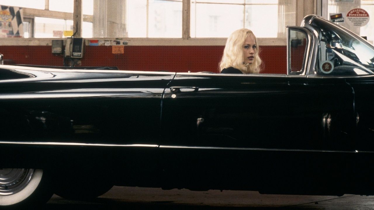 A femme fatale in a black car in Lost Highway