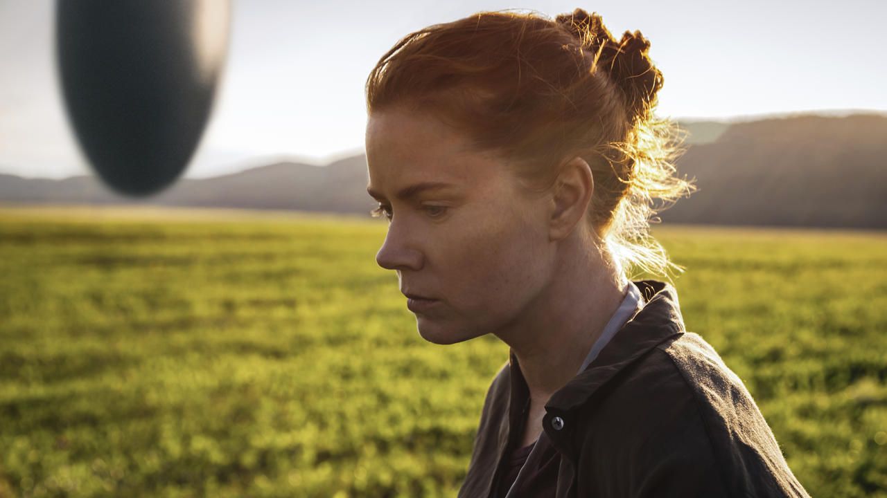 Amy Adams in front of a shell in Arrival. 