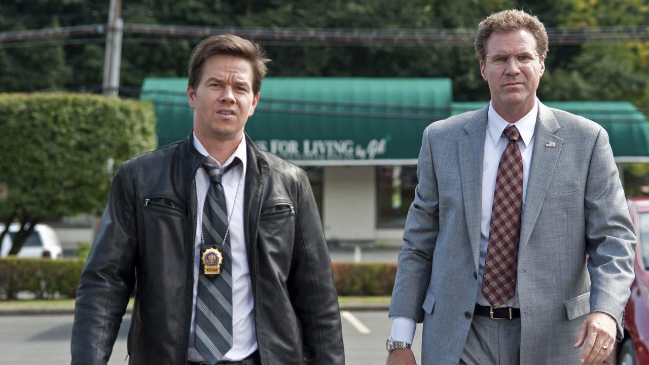 Will Ferrell and Mark Wahlberg walk toward the camera in The Other Guys