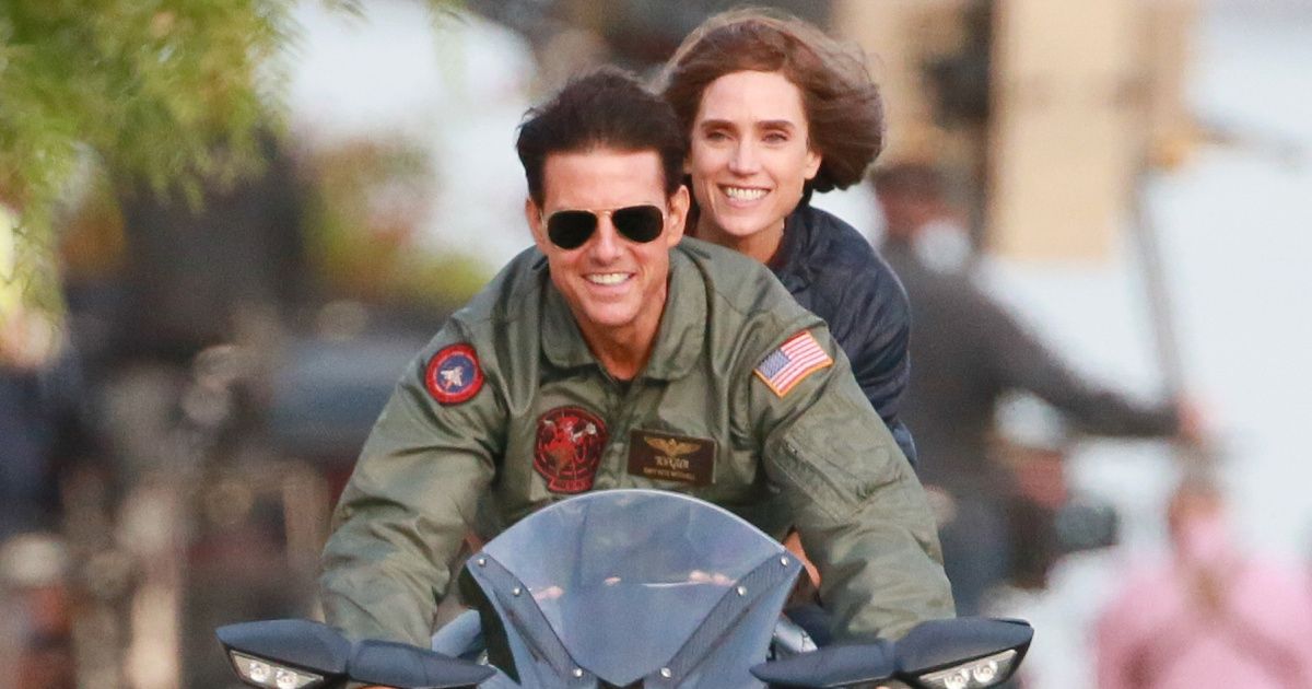 Tom Cruise and Jennifer Connelly on a motorcycle in Top Gun Maverick