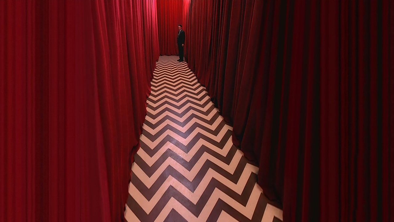Cooper at the end of a hallway in the black lodge