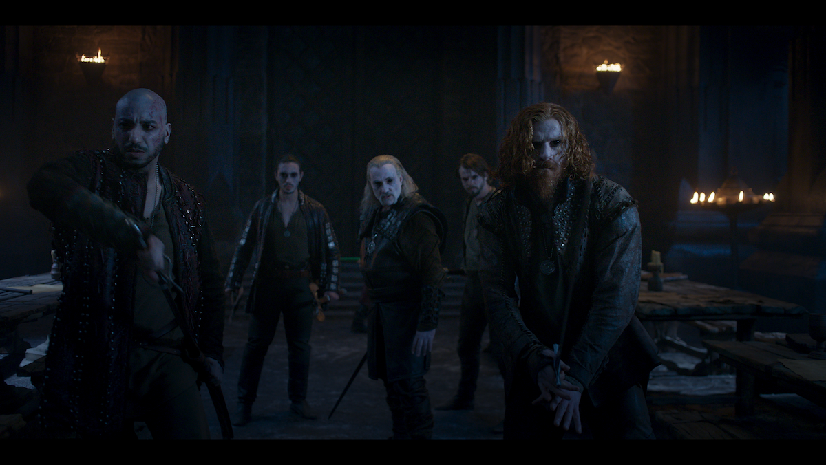 Five of the Witchers getting ready for a fight.