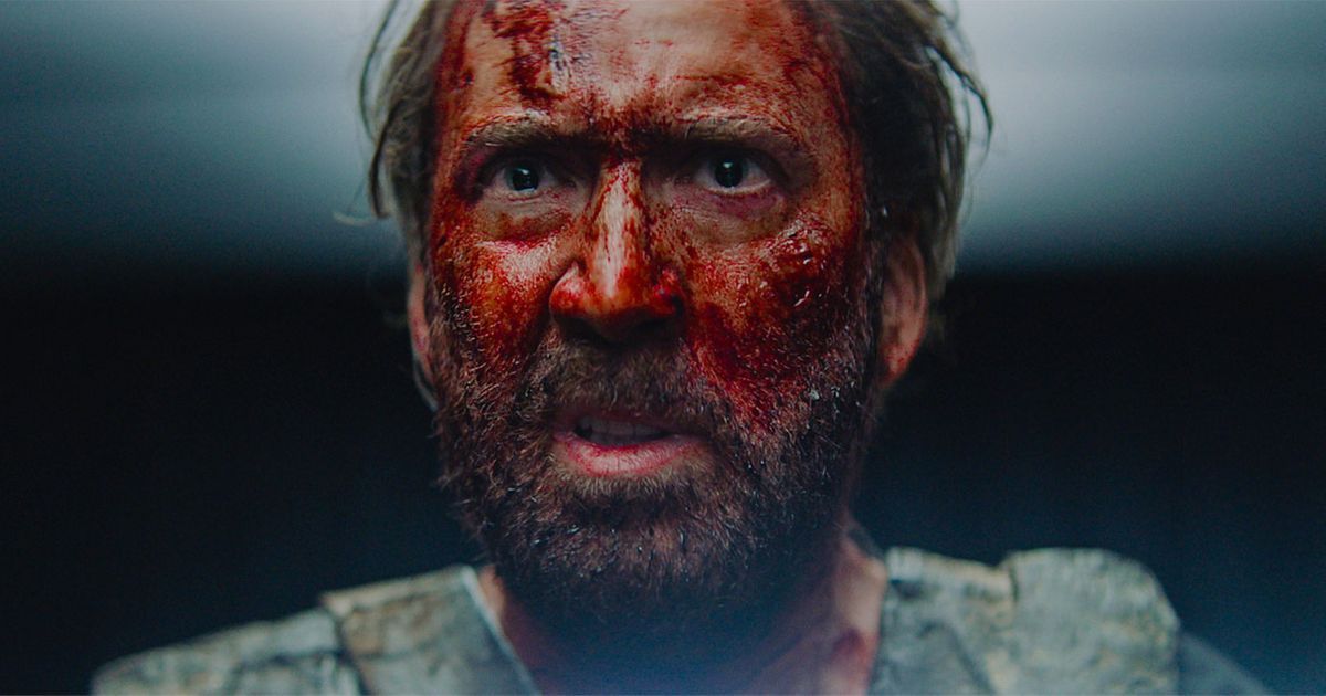 Nicolas Cage has a face covered in blood in Mandy 