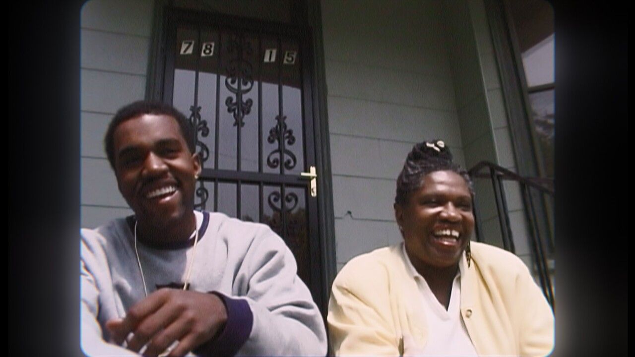 Kanye and his mother on porch steps