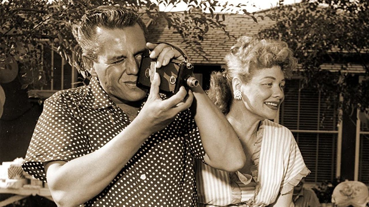 Desi Arnaz shoots film on super 8 with Lucy in the background
