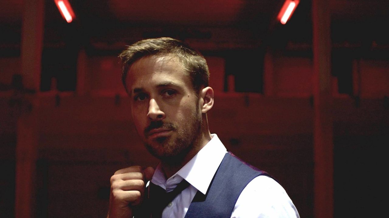 Ryan Gosling makes a fist in the hallway in Only God Forgives