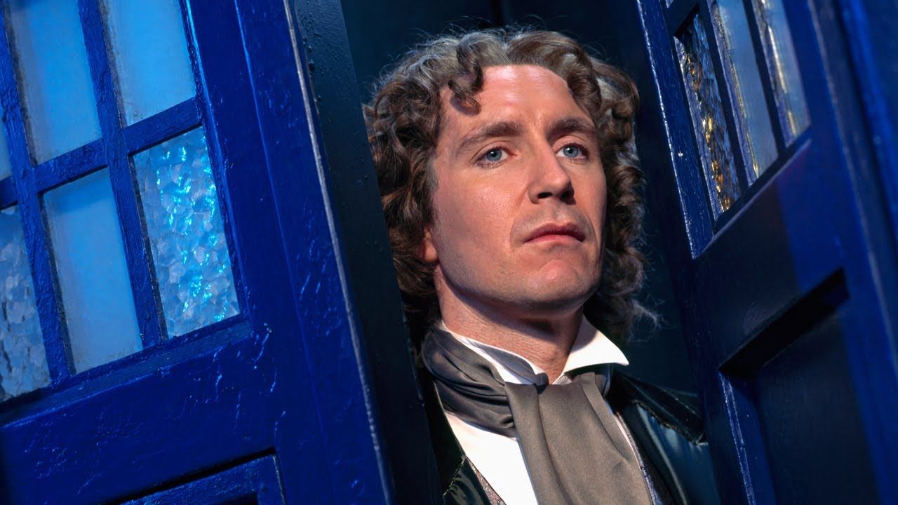 Paul McGann as Dr Who in front of the TARDIS