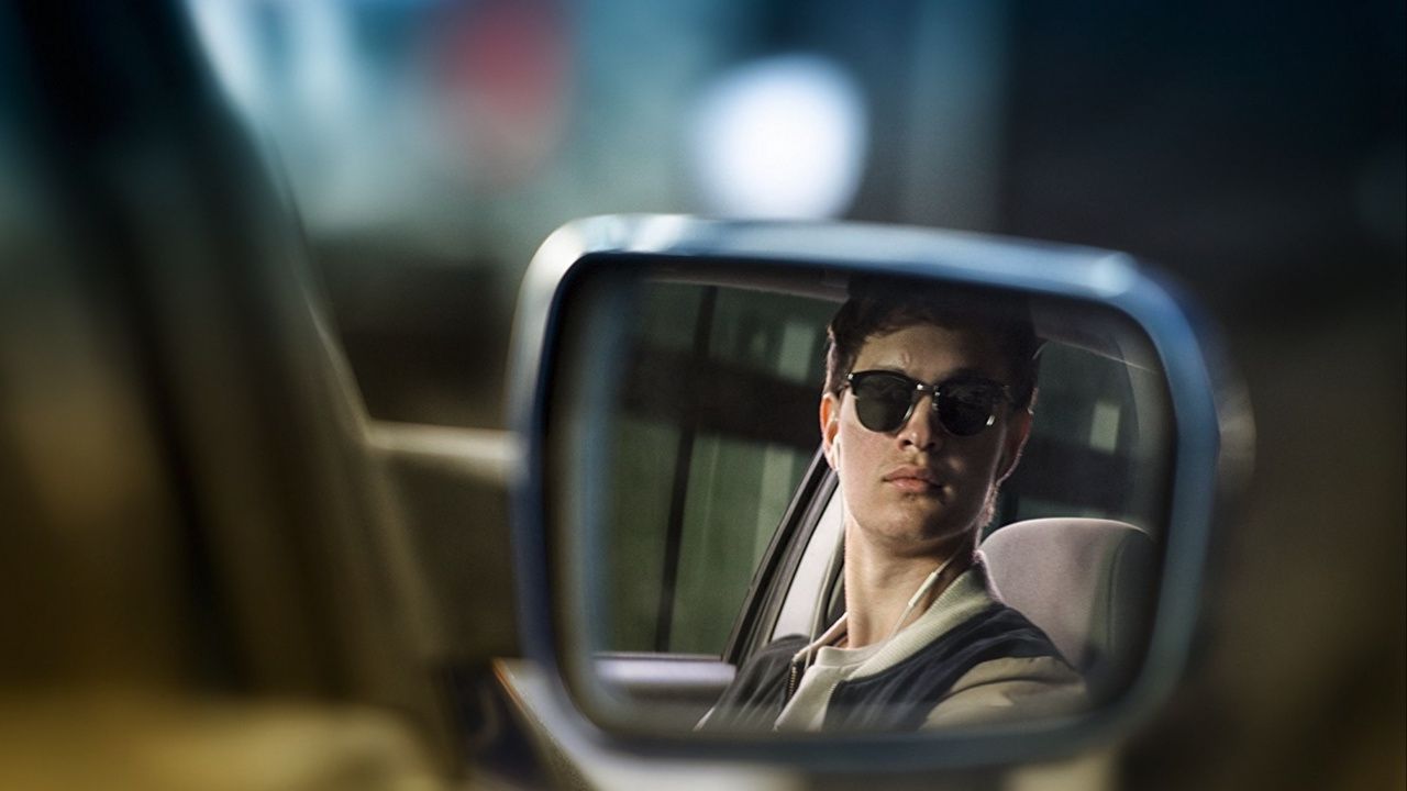 Ansel Engort waiting in his getaway car in Baby Driver.