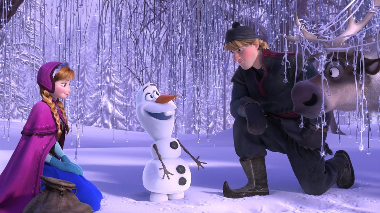 Anna and Kristoff looking at the snowman Olaf while the reindeer Sven has ice on his horns.