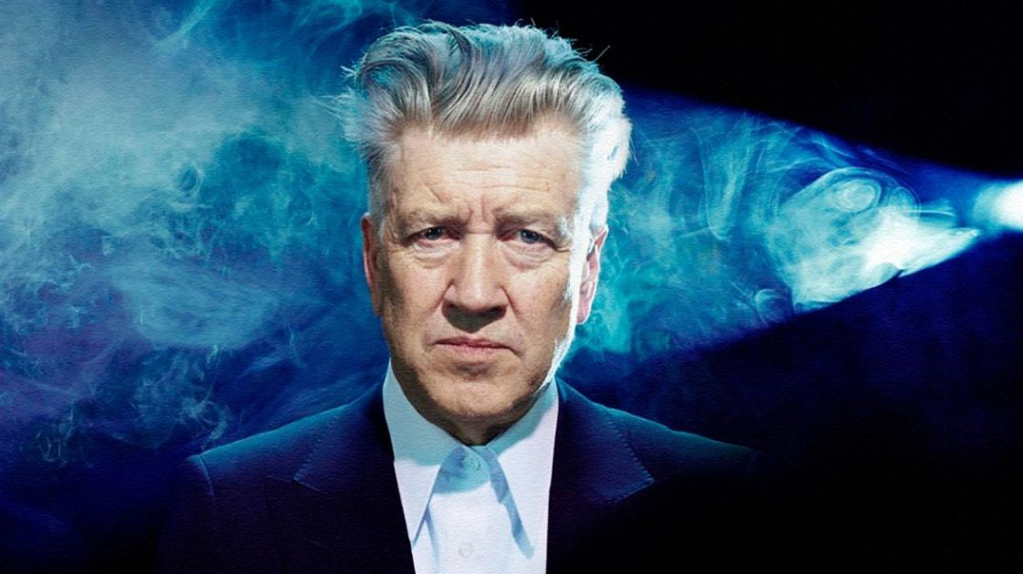 A shot of David Lynch surrounded by blue smoke in the documentary about him