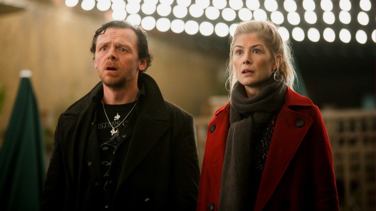 Simon Pegg and Rosamund Pike shocked in The World's End.