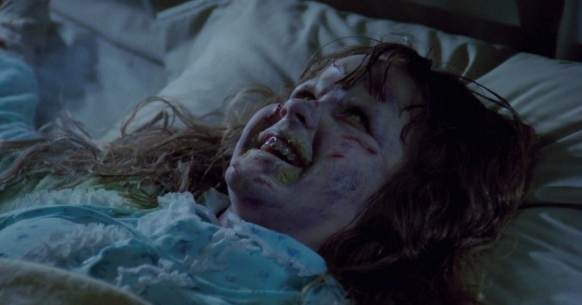 A demon-possessed Linda Blair laughs in The Exorcist