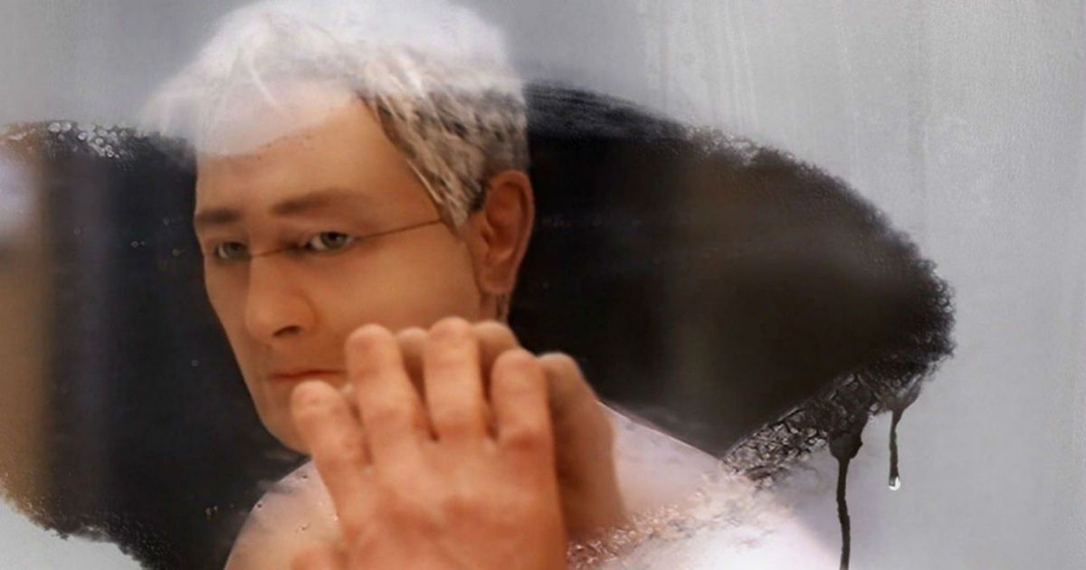 The main stop-motion character wipes condensation from a mirror in Anomalisa