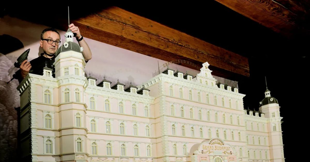 A man designs the miniature Grand Budapest Hotel 