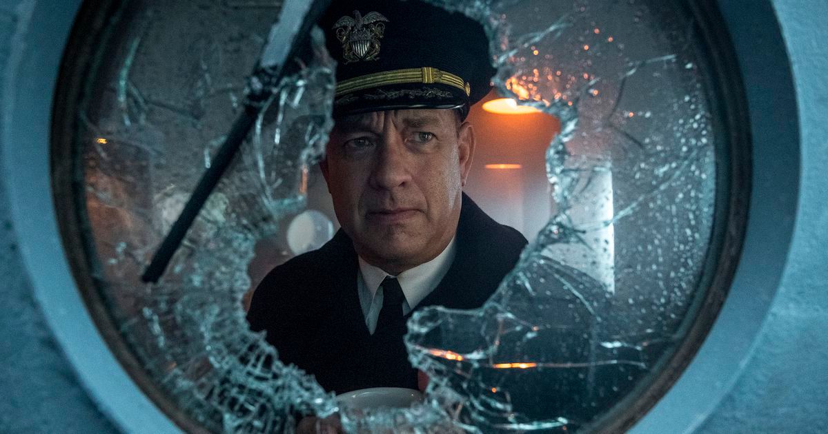 Tom Hanks looks out the shattered window in Greyhound
