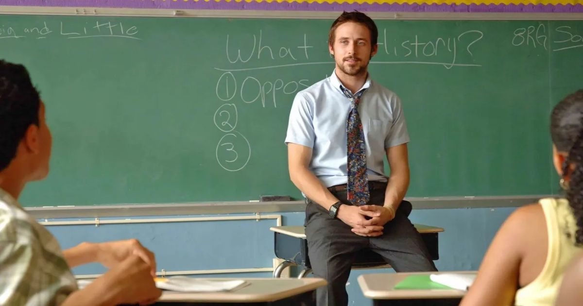 Gosling sits in front of the blackboard in the Half Nelson