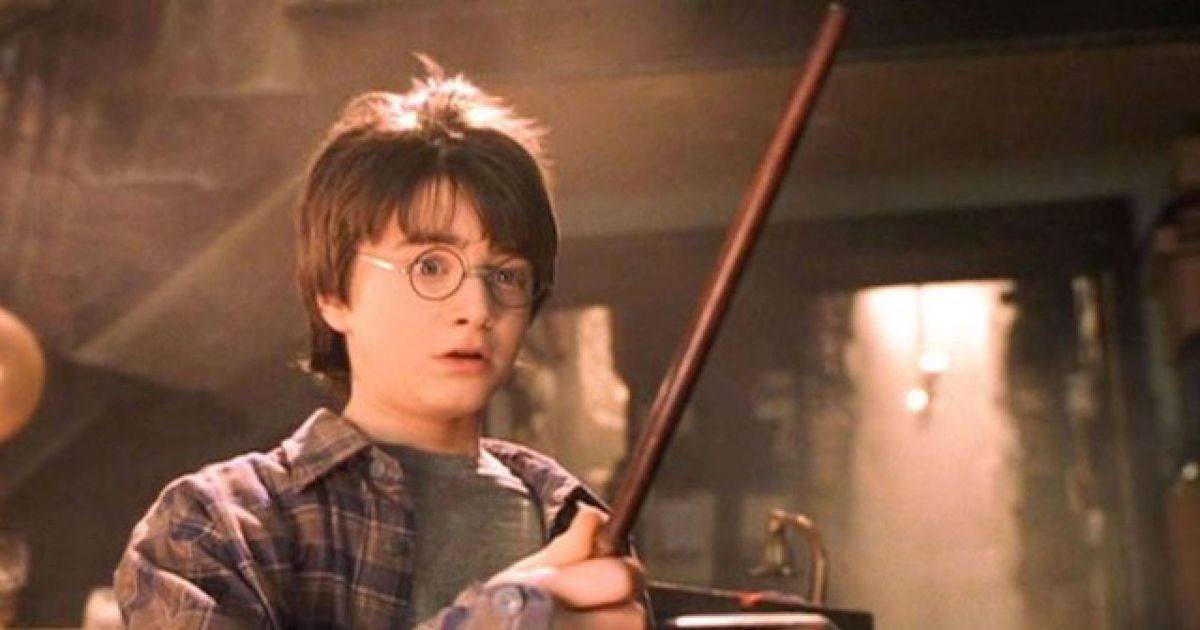 Harry Potter stares at a wand