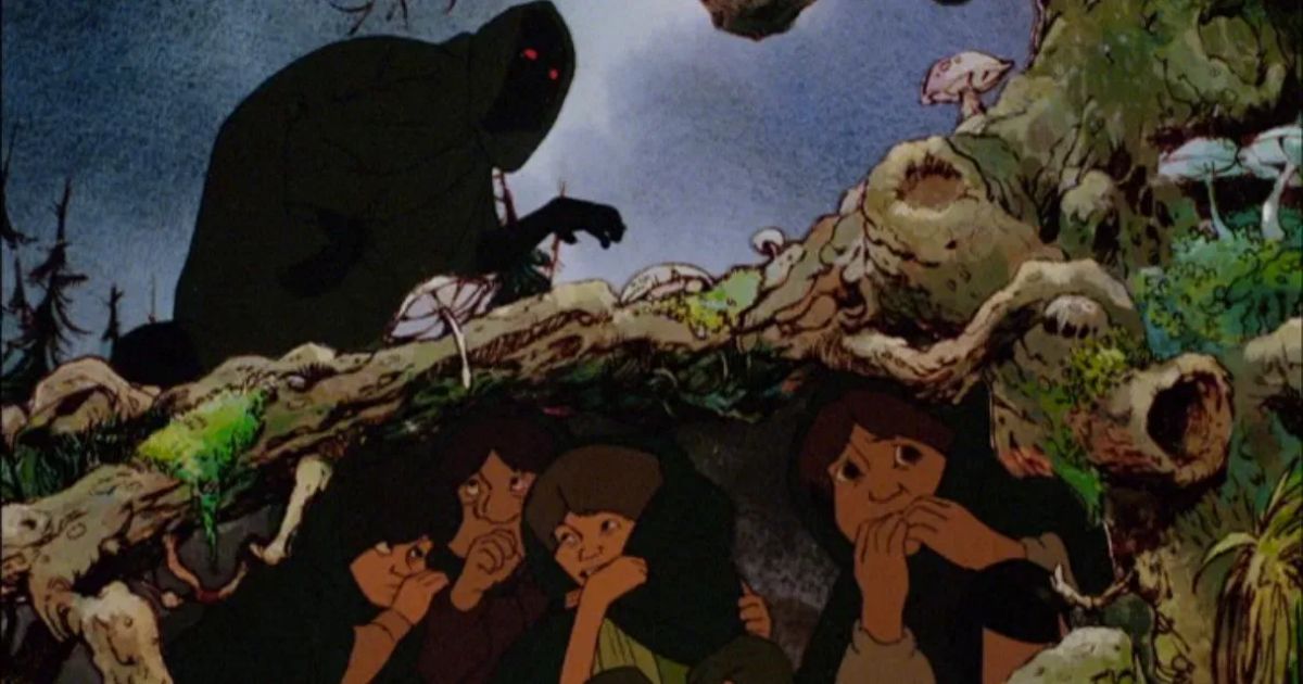 People hide beneath a shadowy figure in Lord of the Rings 1978