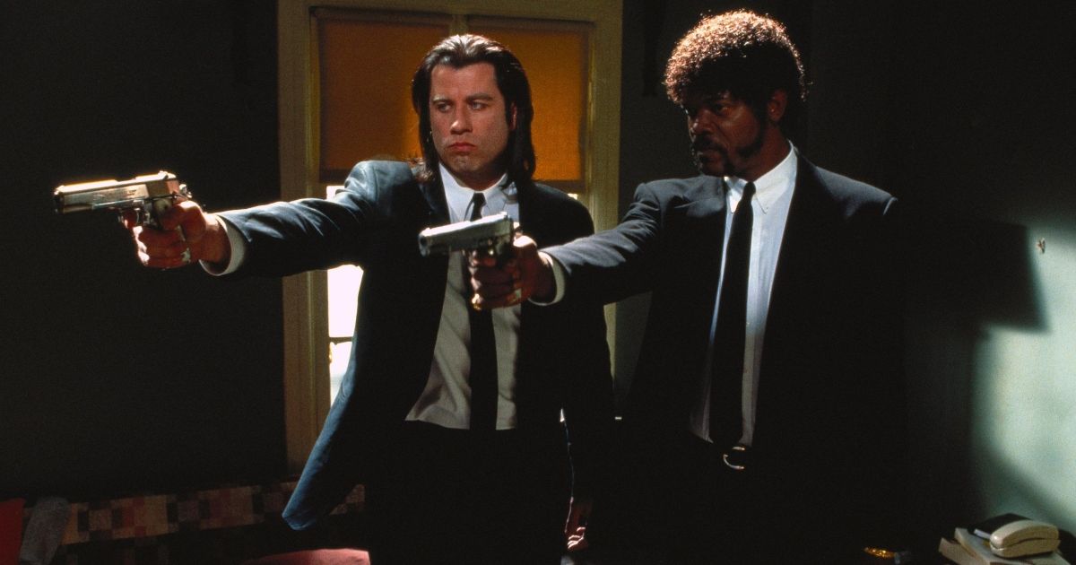 John Travolta and Samuel L. Jackson in Pulp Fuction pointing guns off to the side.