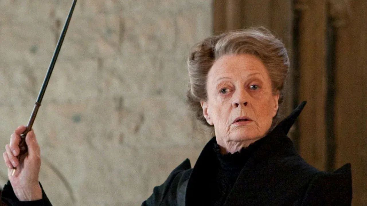 Maggie Smith holds a wand in Harry Potter