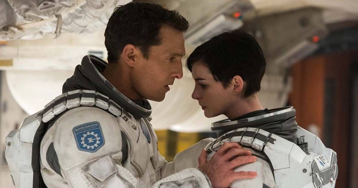 McConaughey comforts fellow astronaut Hathaway in Interstellas