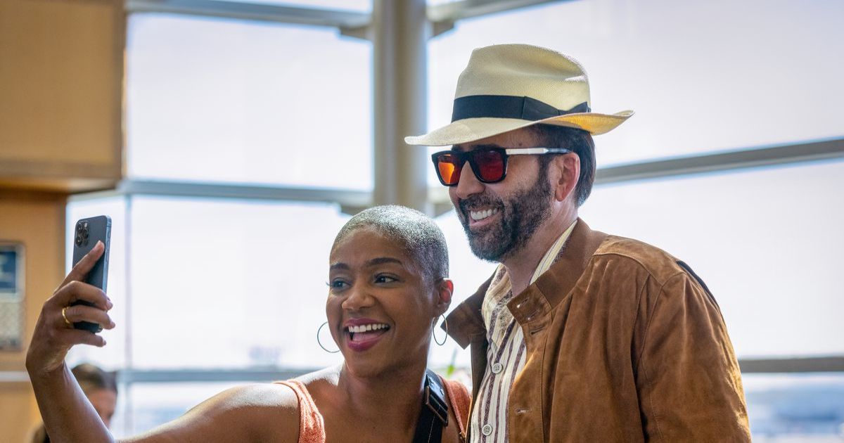 Nic Cage takes a selfie with Tiffany Haddish in The Unbearable Weight of Massive Talent