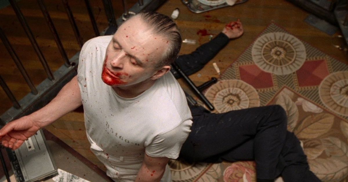 Hopkins with blood on his mouth after biting a man on the floor in Silence of the Lambs