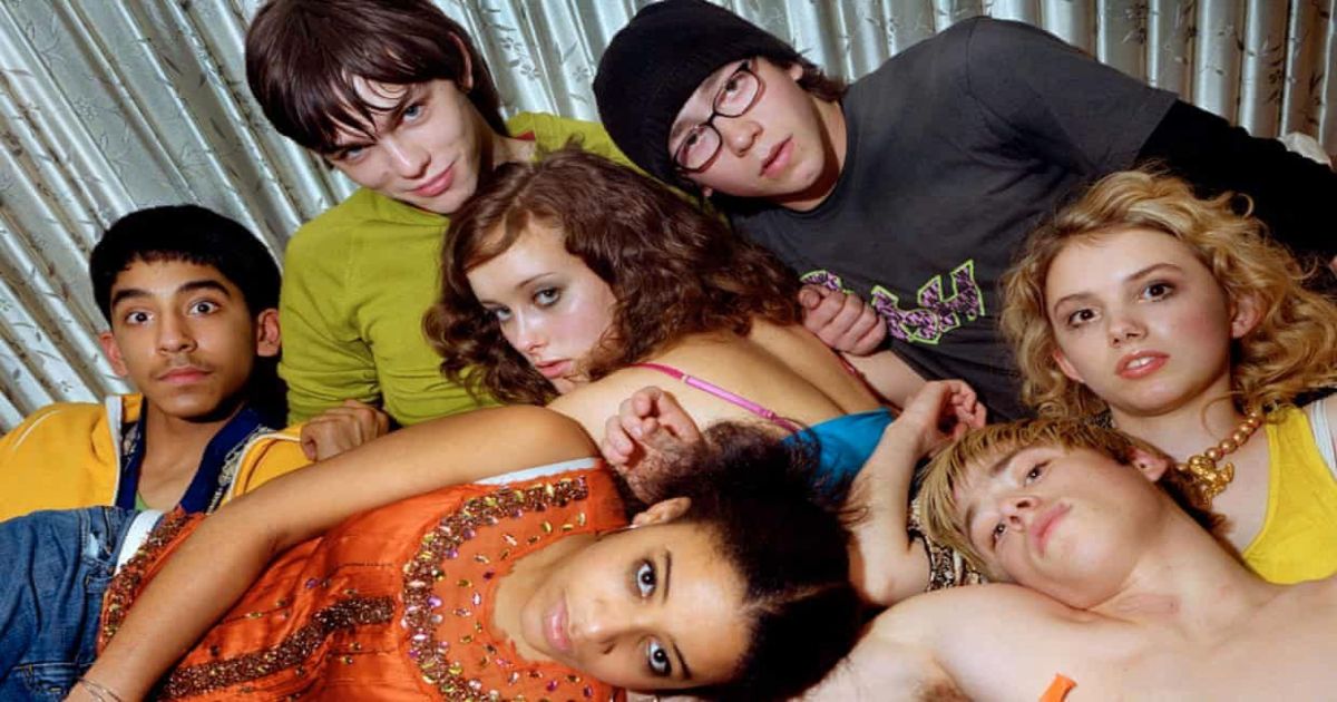 The cast of Skins all laying in bed together