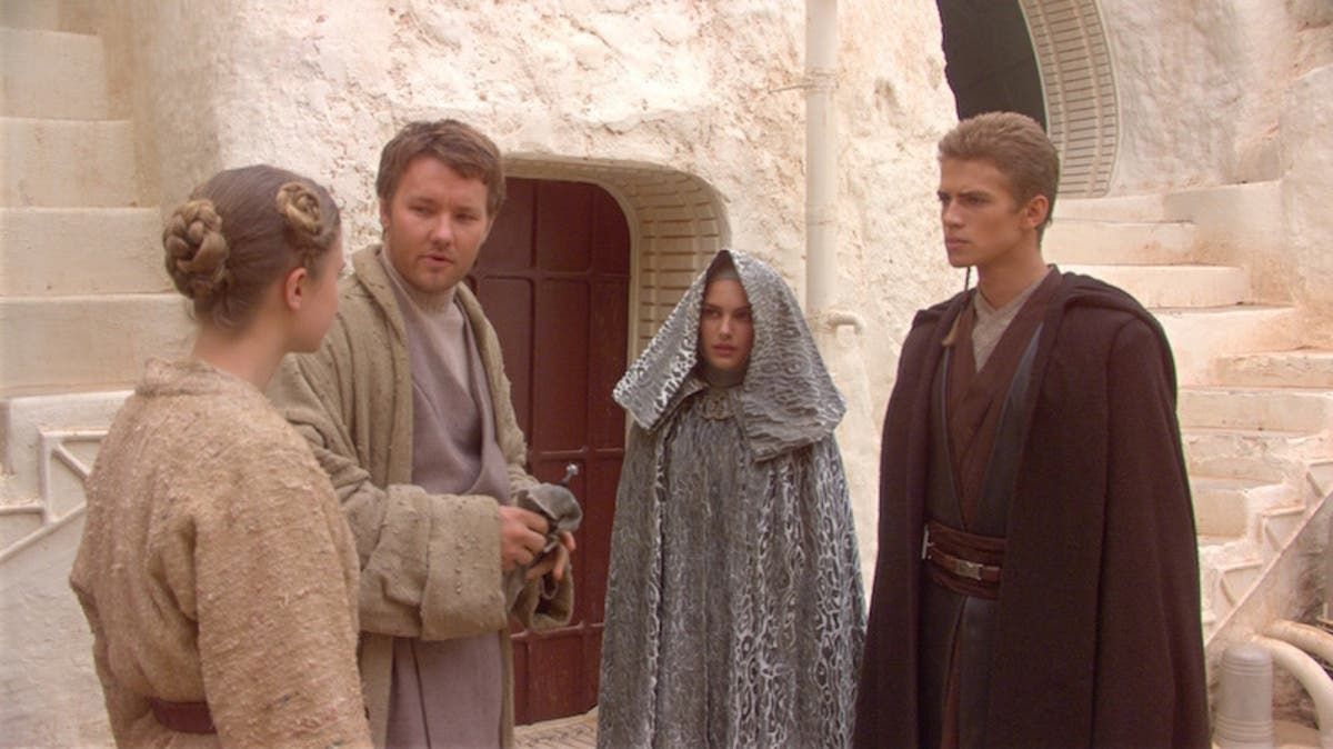 Star Wars Owen Lars (Joel Edgerton) converses with his wife, Anakin, and Pademe