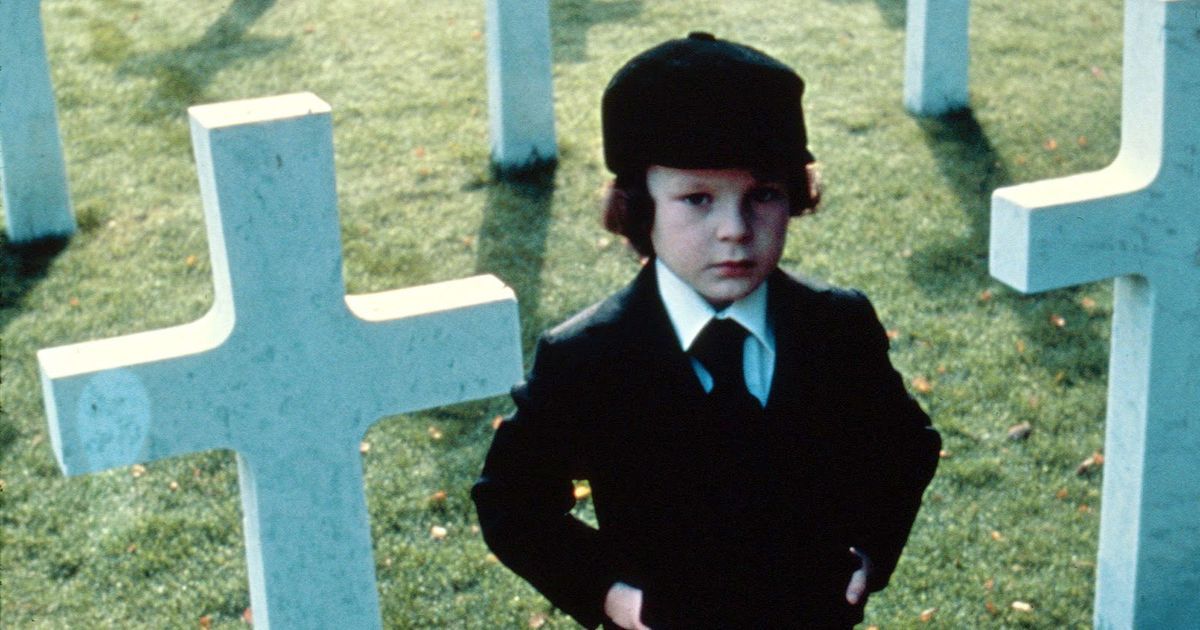 Damien in a cemetery