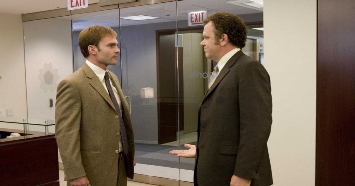 John Reilly and Sean Scott at the office in The Promotion