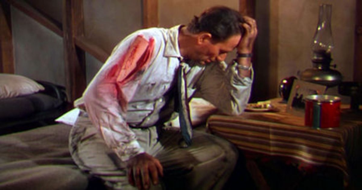 John Wayne, head in hand and bloody in Tycoon