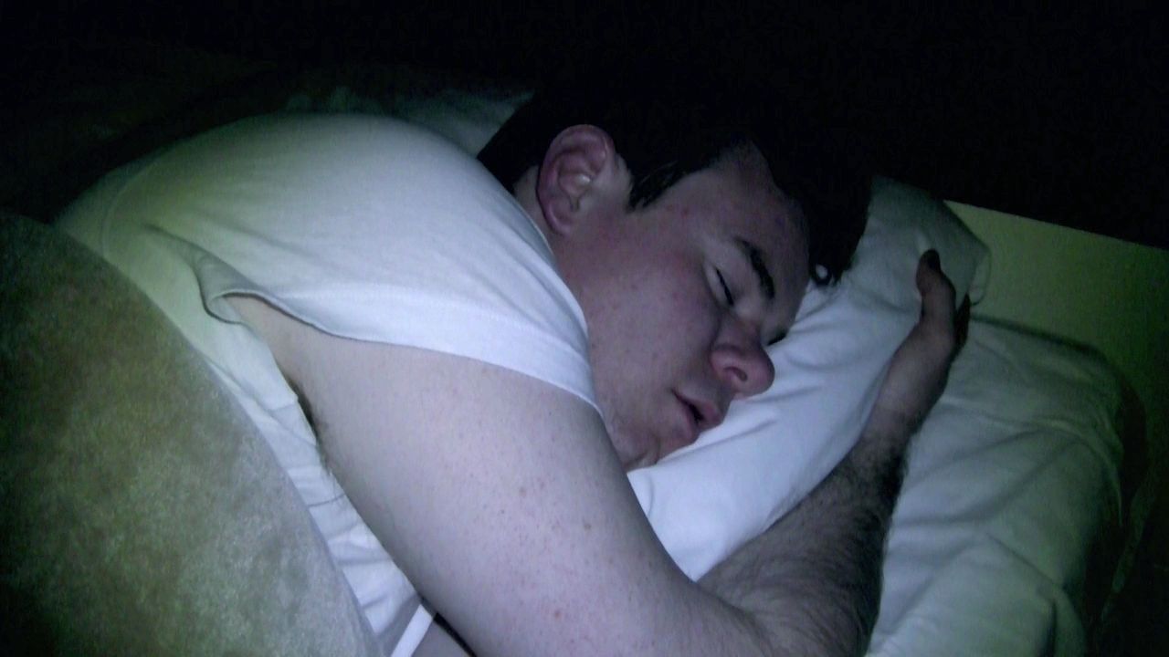 VHS - Joe Swanberg in bed in one of the short horror films