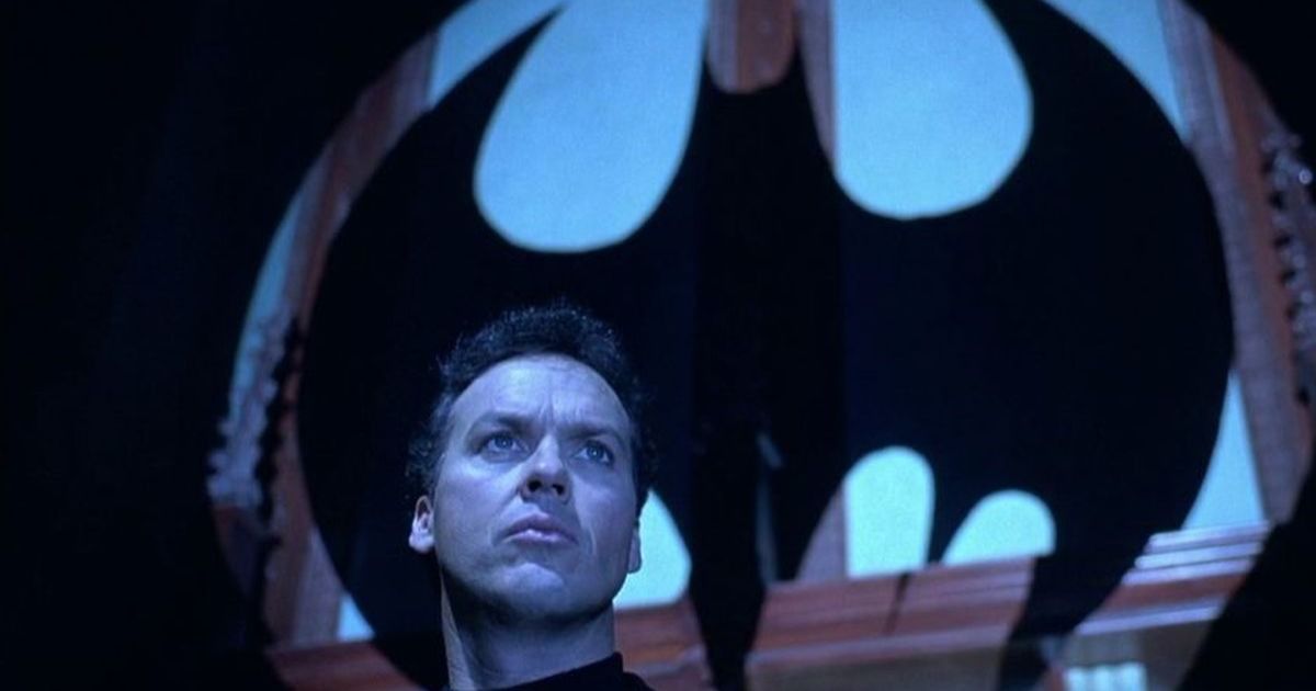 Michael Keaton in front of the bat signal in Batman Returns from 1992