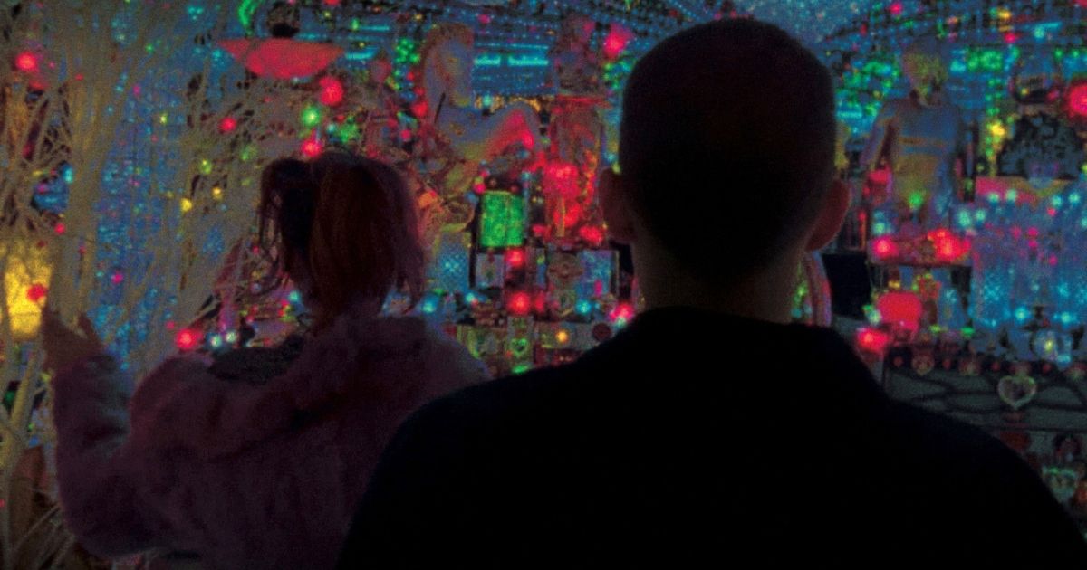 Characters enter a psychedelic scene in Enter the Void (2009).