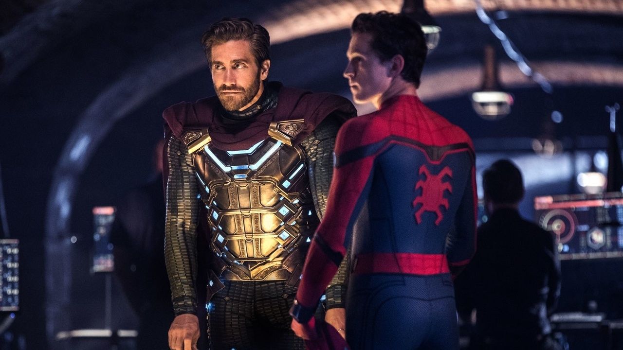 Mysterio and Peter Parker facing one another but looking off camera together.