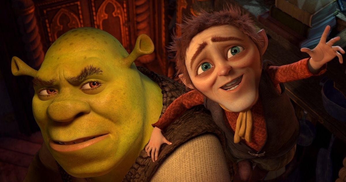 Shrek looking up towards the camera as Rumpelstiltskin hangs on his shoulder, looking and gesturing in the same direction.