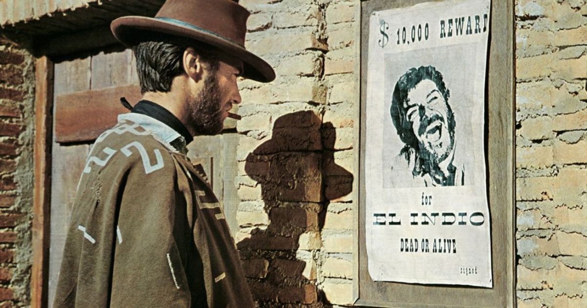 Clint Eastwood looks at a Wanted poster in For a Few Dollars More