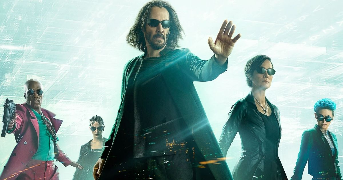 A poster for The Matrix: Resurrections featuring the main cast