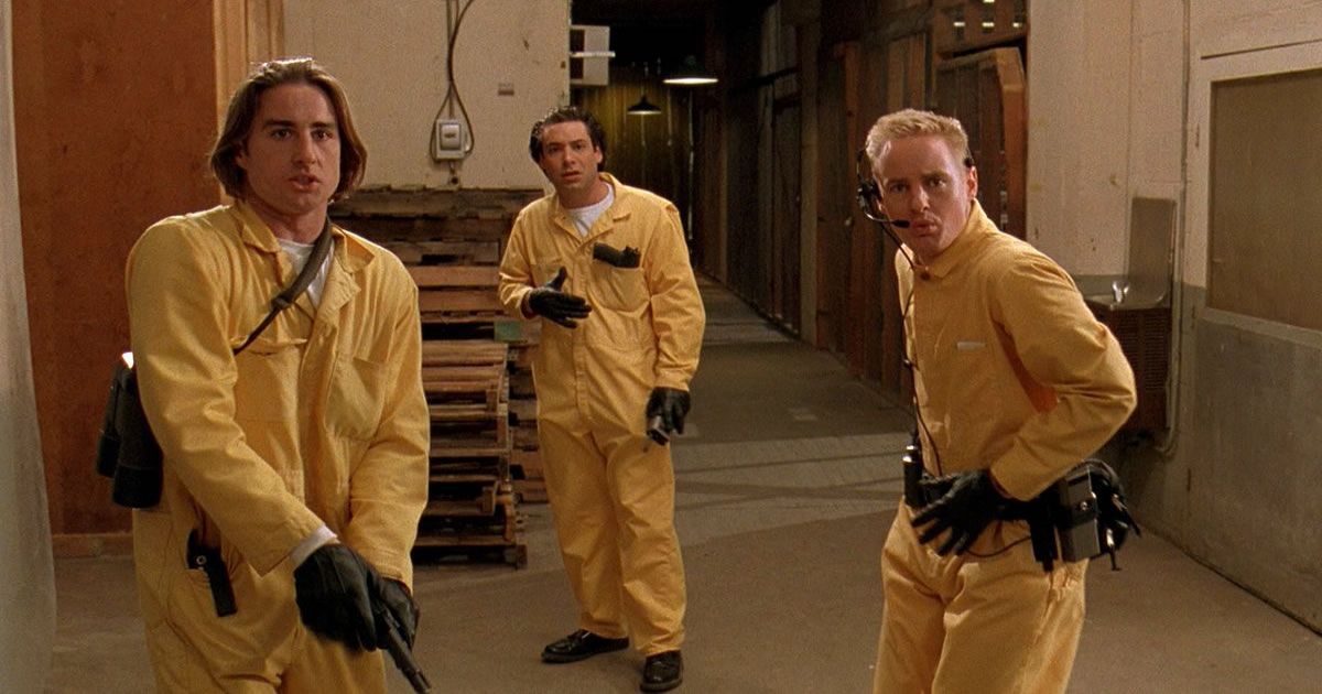 The cast of Bottle Rocket in yellow jumpsuits
