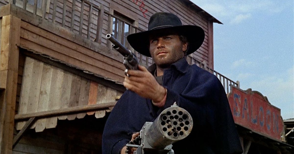 Frances Nero holds a gun as Django
