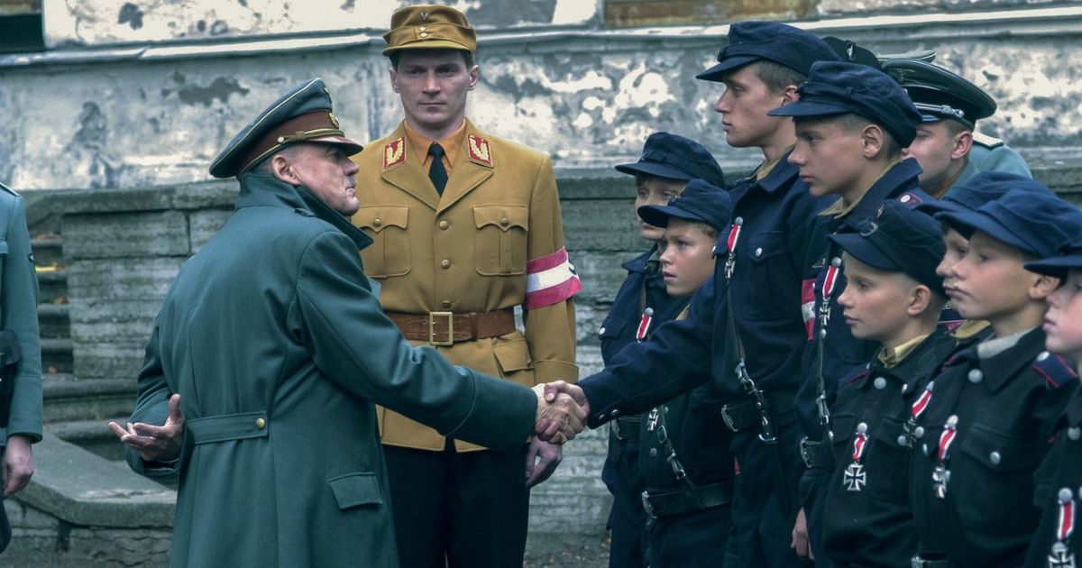 Hitler shakes hands with Nazi Youth in wartorn Germany in Downfall 