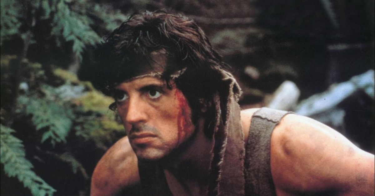 Sylvester Stallone as Rambo in the woods in First Blood