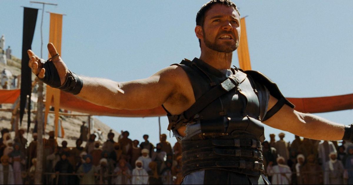 Gladiator Russell Crowe stands with arms open in Gladiator, coming to Netflix in October