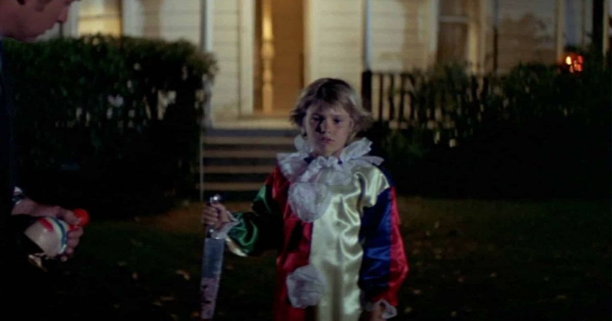 A young Michael Myers holds a knife in Halloween