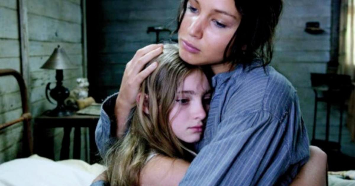 Katniss hugs Primrose in Hunger Games
