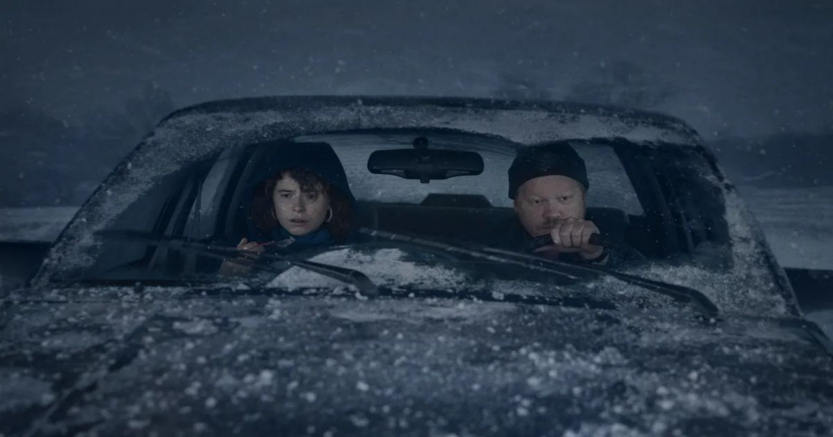 Jesse Plemons and Jessie Buckley drive in a snowstorm in I'm Thinking of Ending Things 